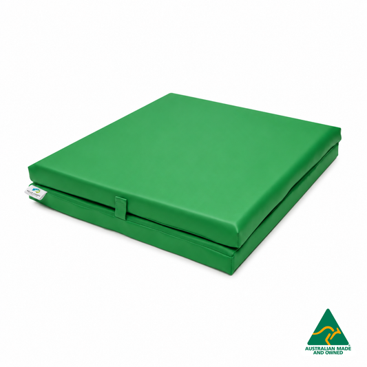 Folded Green Foldable Hello Comfy Child Care Sleep Mat made from waterproof PVC vinyl and foam, tested to AS/NZS 8811.1:2013, Australian-made for daycare and child care use