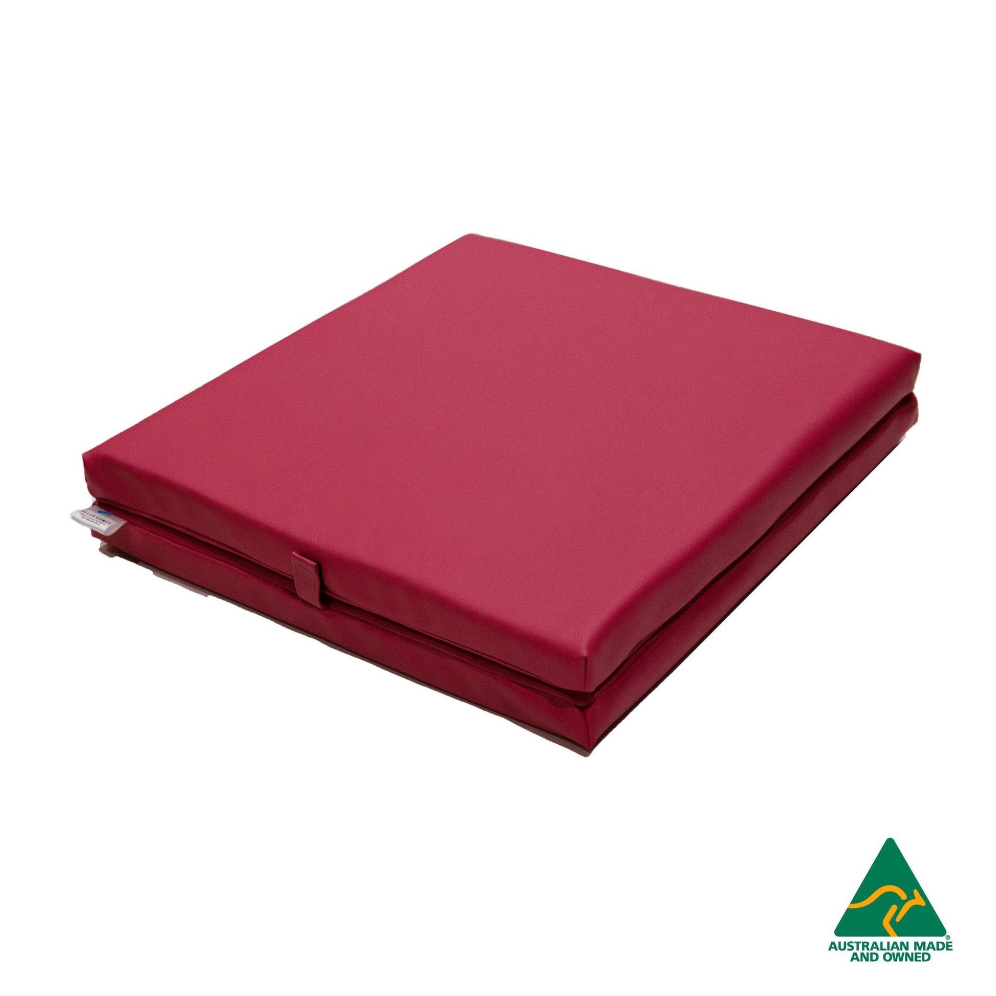 Folded Pink Foldable Hello Comfy Child Care Sleep Mat made from waterproof PVC vinyl and foam, tested to AS/NZS 8811.1:2013, Australian-made for daycare and child care use
