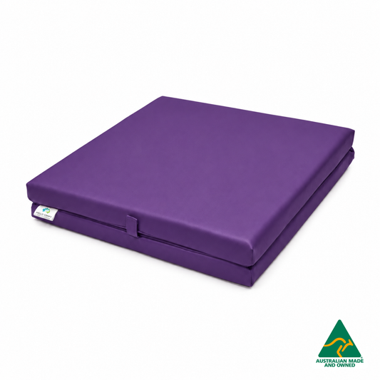 Folded Purple Foldable Hello Comfy Child Care Sleep Mat made from waterproof PVC vinyl and foam, tested to AS/NZS 8811.1:2013, Australian-made for daycare and child care use