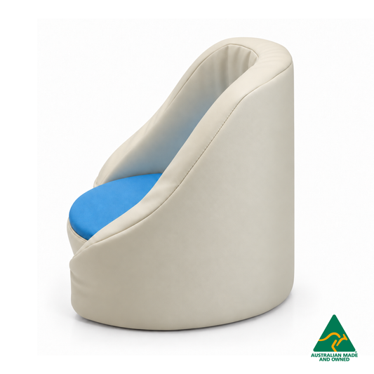 Side view of the Blue Hello Comfy Child Care Cuddle Chair with a removable circular foam seat cushion, waterproof PVC vinyl upholstery and supportive chair backing. Made in Australia for child care centres, kindergartens, schools and daycare environments.