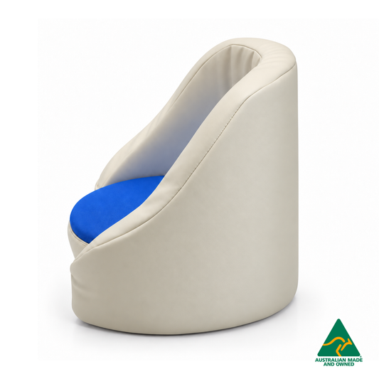 Side view of the Royal Blue Hello Comfy Child Care Cuddle Chair with a removable circular foam seat cushion, waterproof PVC vinyl upholstery and supportive chair backing. Made in Australia for child care centres, kindergartens, schools and daycare environments.