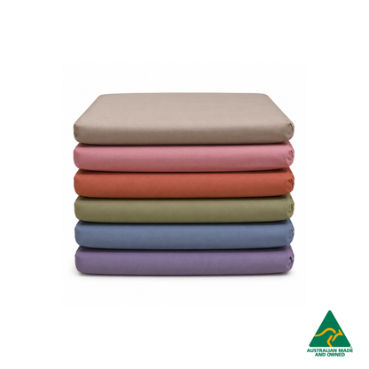 Stack of Hello Comfy 100% cotton sleep mat fitted bottom sheets for a child care sleep mat, fully elasticated and Australian made for daycare centres.