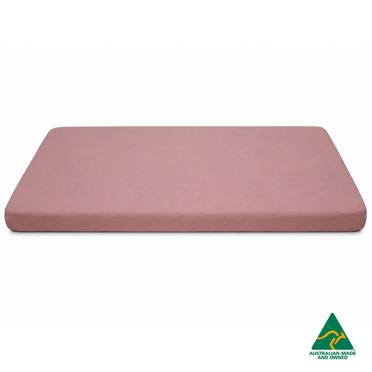 Side view of a Marshmallow Pink Hello Comfy 100% cotton fitted bottom sheet for a child care sleep mat, fully elasticated and Australian made for daycare centres.