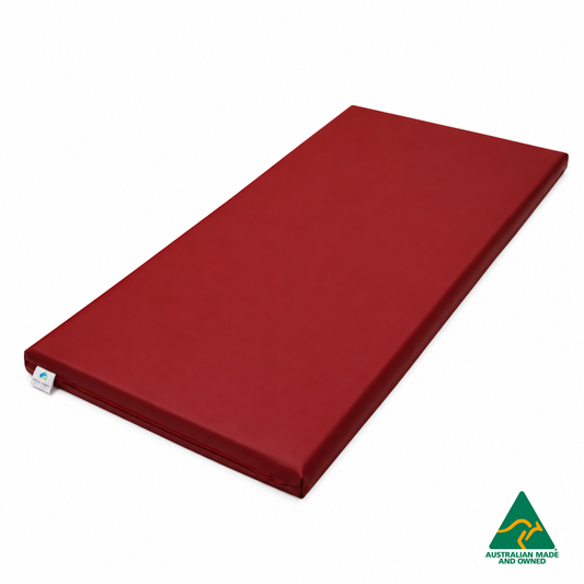 Red Hello Comfy Child Care Sleep Mat made from waterproof PVC vinyl and foam, tested to AS/NZS 8811.1:2013, Australian-made for daycare and child care use