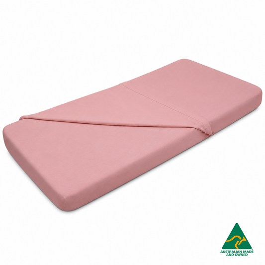 Front view of Marshmallow Pink Hello Comfy 100% cotton sleep mat sheet set with fitted and flat sheet, elastic-fitted, Australian-made for daycare and child care centres