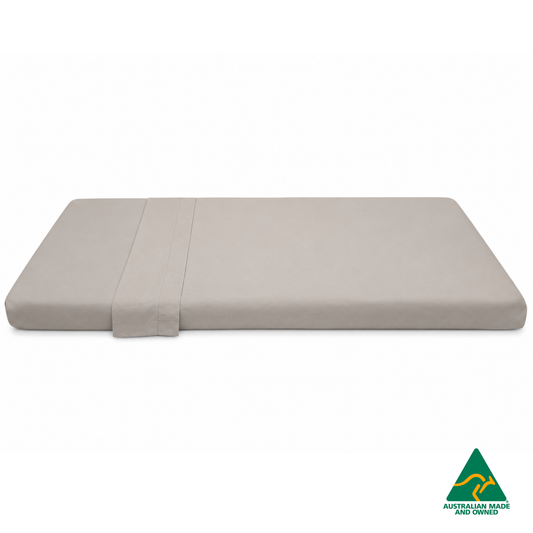 Side view of Beige Hello Comfy 100% cotton sleep mat sheet set with fitted and flat sheet, elastic-fitted, Australian-made for daycare and child care centres