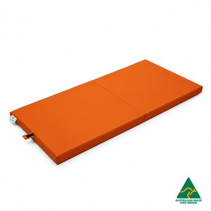 Unfolded Orange Foldable Hello Comfy Child Care Sleep Mat made from waterproof PVC vinyl and foam, tested to AS/NZS 8811.1:2013, Australian-made for daycare and child care use