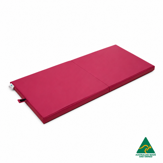 Unfolded Pink Foldable Hello Comfy Child Care Sleep Mat made from waterproof PVC vinyl and foam, tested to AS/NZS 8811.1:2013, Australian-made for daycare and child care use