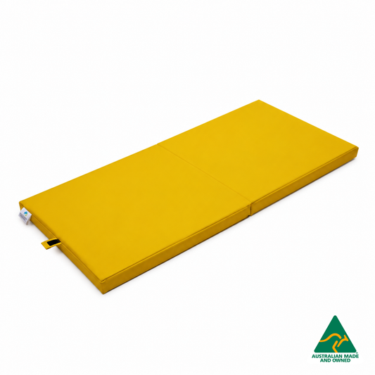 Unfolded Yellow Foldable Hello Comfy Child Care Sleep Mat made from waterproof PVC vinyl and foam, tested to AS/NZS 8811.1:2013, Australian-made for daycare and child care use