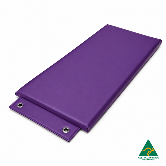Angled view of the Purple Hello Comfy Hanging Child Care Sleep Mat with two reinforced eyelets, waterproof vinyl and foam tested to AS/NZS 8811.1:2013, Australian-made for child care, kindergarten, school and daycare use.