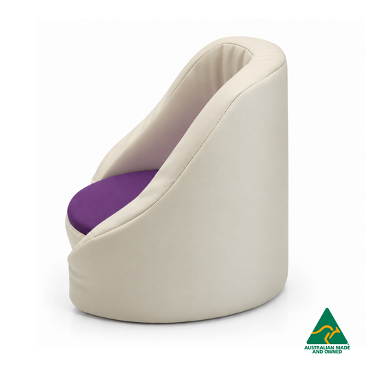 Side view of the Purple Hello Comfy Child Care Cuddle Chair with a removable circular foam seat cushion, waterproof PVC vinyl upholstery and supportive chair backing. Made in Australia for child care centres, kindergartens, schools and daycare environments.