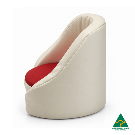 Side view of the Red Hello Comfy Child Care Cuddle Chair with a removable circular foam seat cushion, waterproof PVC vinyl upholstery and supportive chair backing. Made in Australia for child care centres, kindergartens, schools and daycare environments.